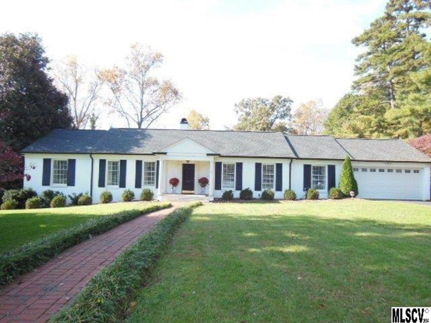 LHCC Golf Course living in a fabulous Crouch Built Home! This traditional brick ranch offers comfortable living with formal living room & dining room, den with gas log fireplace & built-ins, kitchen with breakfast area that opens to screened porch with T & G ceiling overlooking the golf course. The master bedroom has an updated master bath with Carrara marble shower. The lower level offers an in-law suite complete with kitchenette, living area, bedroom & bath. The walk-up attic, built-ins, additional storage in the basement, private backyard, park-like setting & quality construction make this house easy to call HOME!