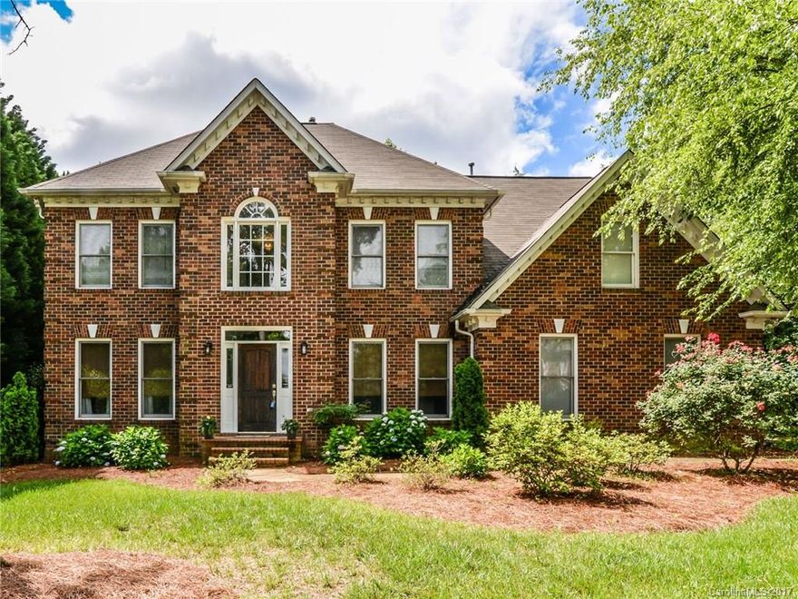 Incredible layout in desirable Providence Crossing! Dual Master Bedrooms w/ one on main level. Stunning kitchen renovation, perfect for entertaining. 2-story dining w/ fireplace. Hardwoods throughout. Downstairs office, family room & living room or playroom. Downstairs Master has sitting room off deck, spacious bathroom, large walk-in closet. 2nd master bedroom w/full bath & balcony. Bonus room up w/ rear stairs. Highly rated schools, proximity to restaurants/retail, this house is a must see!