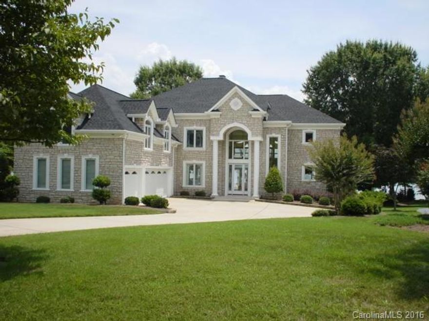 Astounding waterfront residence in Lake Norman's premier gated community-Alexander Island! Everything is in pristine condition and beautiful... One of the better BIG WATER lots and views in the entire area, with a newer pier/personal lift.  Spectacular grounds/landscaping front and back. Inside, from the  remarkably designed kitchen, to the personal steam shower in the master...one can see the quality. All furnishings are negotiable...one of a kind!  Shows beautifully...views are amazing....