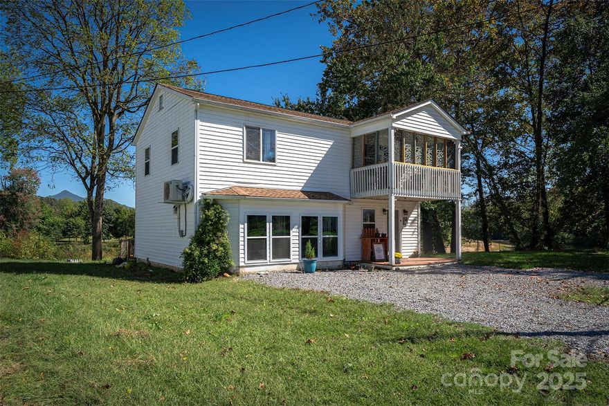 Charming 2 story riverside retreat nestled along the serene banks of the Pigeon River across from River’s Edge Park and bird sanctuary. This delightful home, originally built in 1940 with a vision, offers a perfect blend of historic charm and modern comfort. This property is an idyllic escape from the hustle and bustle of everyday life. An outdoor oasis, the expansive 0.90 acre lot offers numerous opportunities for outdoor activities, from gardening to enjoying evening bonfires. The proximity to the river ensures a serene and picturesque setting for all your outdoor gatherings. This home presents a rare opportunity to own a slice of history in downtown Clyde, NC.  Whether you’re looking for a peaceful full-time residence or a charming vacation getaway, 3755 Broad St is a must-see. Vacation rentals allowed. View of river & Smoky Mountains. Just 30 min to Asheville,10 min to Lake Junaluska/Waynesville, 35 min to Western Carolina Univ.  New roof in 2024. Electrical updated 2025, new appliances, new gas water heater, new mini-splits HVAC. Due to sturdy concrete block construction this home survived Hurricane Helene. Now remodeled to code and ready for a new owner to enjoy it.