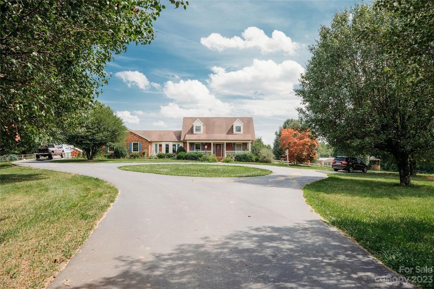 Nestled in Yadkin wine country, this almost 33-acre property has over 300K in improvements and endless possibilities. Boasting 2 homes, 3 fenced in pastures, 2 large barns, 2 loafing barns, a pavilion, apple trees, an acre of wildflowers, finished outdoor office space, solar, pond and so much more. For those looking to return to the outdoors and make an income, the forested glamping site has 4 tent platforms and a state-of-the-art outdoor composting bathhouse. Whether you envision a farming venture, equestrian pursuits, or a tranquil retreat, this property has everything you need to live your dream. With recent price drop and the green, spring weather looming – this property won’t last long. Schedule to see it today!