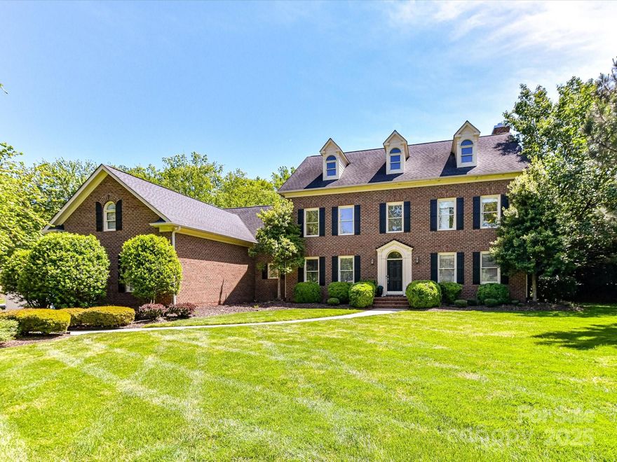 Immaculate two-story (3-car garage) custom home in Ballantyne Country Club, situated on a beautiful corner lot with Primary Suite on the main. This spacious floorplan boasts stately features like custom millwork, extensive crown moldings, uniquely carved archways & coffered ceilings. The Spacious kitchen features beautiful cabinetry, quarts counters and tons of natural light, open to the family room with a stunning view of the back yard. The second floor boasts two additional bonus rooms in addition to the 3 spacious ensuite bedrooms. Huge flat backyard to be enjoyed by all. Community features with optional memberships include Golf Course, Cabana, Club House, Fitness Center, Outdoor Pool, Playground, Pond, Putting Green, Sidewalks, Sport Court, Street Lights, Tennis Court(s), Walking Trails.
