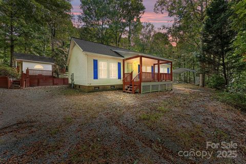 Photo of 38692 Smoke Ridge Road, New London, NC 28127 (MLS # 4313112) Photo of 38692 Smoke Ridge Road, New London, NC 28127 (MLS # 4313112)