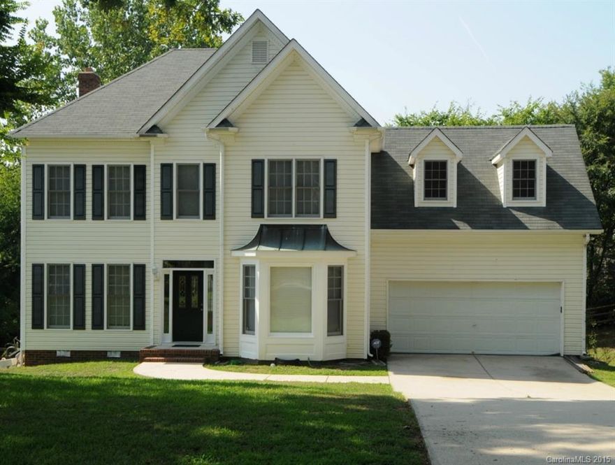 FANTASTIC N'HOOD - Open floor plan w/great layout in this spacious home; 4 bdrm + bonus rm; 2.5 bathrooms; Large master w/deep trey ceiling & huge walk-in closet; master bath has separate large shower, garden tub, dual sinks & tile floors; maple kitchen cabs w/granite countertops; 2 bay windows; French doors for large office; Crown moulding in formal rms; formal dining rm; custom built in around the fireplace in the den; deck and large fenced back yard. Fresh paint thruout & new windows in den.