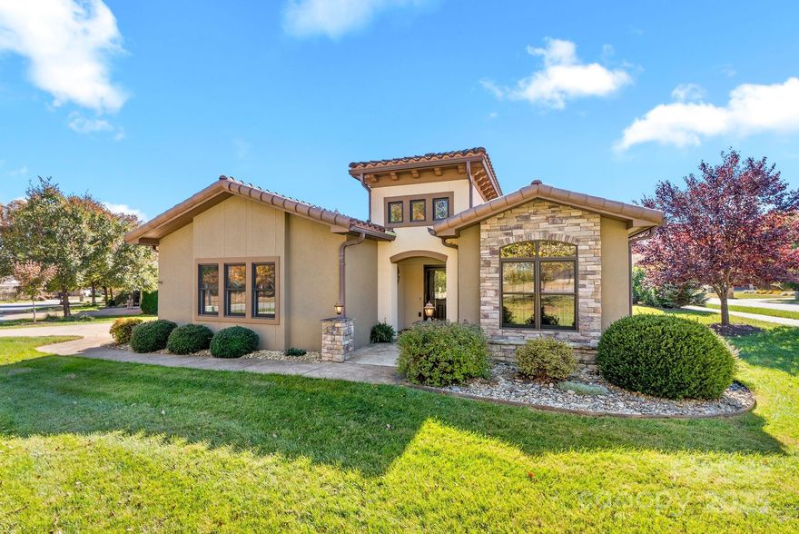Effortless one-level living awaits you in Bonito Ocaso in Crowell Farms! This thoughtfully designed home blends peaceful mountain community life with ultimate convenience—you’re just 15 minutes to downtown Asheville. Step inside the large, covered entrance to an elegant tiled foyer with a soaring ceiling, opening to the spacious, open-concept floor plan. Entertaining is a delight in the well-appointed kitchen, featuring a breakfast bar and ample counter space, flowing seamlessly into the dining and living areas. The living room boasts a gas fireplace with stone surround, tray ceiling, recessed lighting, and French doors opening to the patio. Spacious primary suite is a true retreat offering dual walk-in closets, soaking tub, walk-in shower, and double vanity. Enjoy your morning coffee or a good book on the covered patio or grilling on the sunny terrace. The pet-friendly neighborhood features wide sidewalks, and the low HOA includes lawn maintenance. Minutes to the NC Arboretum, Blue Ridge Parkway, WNC Farmers Market and just 10 minutes to West Asheville’s dining and shopping.