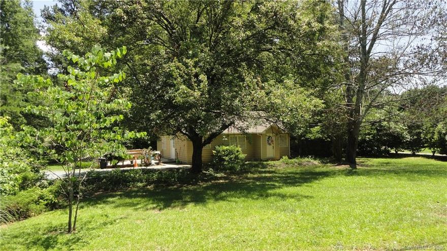 Huge lot set back from Hiway 51-backs up to horse farm-very private! Freshly painted, new deck and new carpet! Note price reduction!