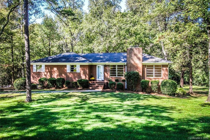 Lovely cared for one owner home on beautiful large lot with plenty of flat play space.  It also has lots of privacy with trees at the rear of the property.  The hardwood floors are fabulous.  They have just been refinished.  The interior has just been freshly painted in a trendy neutral color.  Wonderful screened porch & deck.  Large drive under garage and full unfinished basement with expansion potential. The basement is full daylight in the rear.
Living Rm/Dining/Rm combo, Fireplace in the LR