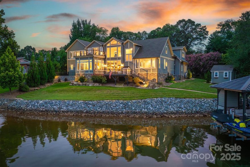 Discover your dream home on desirable Lake Hickory! This stunning property boasts breathtaking lake views, high ceilings, and an open floor plan that invites abundant natural light. The kitchen features an all-induction stove and instant hot water under the sink. Upstairs you’ll find a large bonus room with kitchenette along with the other bedrooms and living area.
Enjoy the convenience of a flat, easily accessible lot down to the boat dock that was built in 2021.
It’s perfect for water enthusiasts and comes equipped with electric lifts for both the boat and jet skis. 

A newly constructed detached garage features a fully finished apartment, also offering captivating views of the lake.

This property is just minutes from shopping and restaurants. Whether you're entertaining or relaxing, this home provides the perfect blend of luxury and comfort.
The home can come fully furnished with the boat and both jet skis.


Make your dreams of living on the lake come true and schedule a showing today!