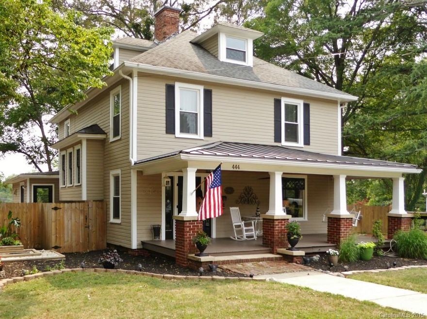 Beautiful Victorian home located in the historical district of downtown Mooresville. Enjoy all the modern conveniences of the open kitchen with stainless steel appliances. This home has all the modern comforts but retains original moldings, pocket doors, wood floors, mantles & fireplaces. NEW Exterior paint June 2015, New HVAC. Third floor is perfect for office, den or playroom. Large fenced yard! Home Warranty provided and No HOA.