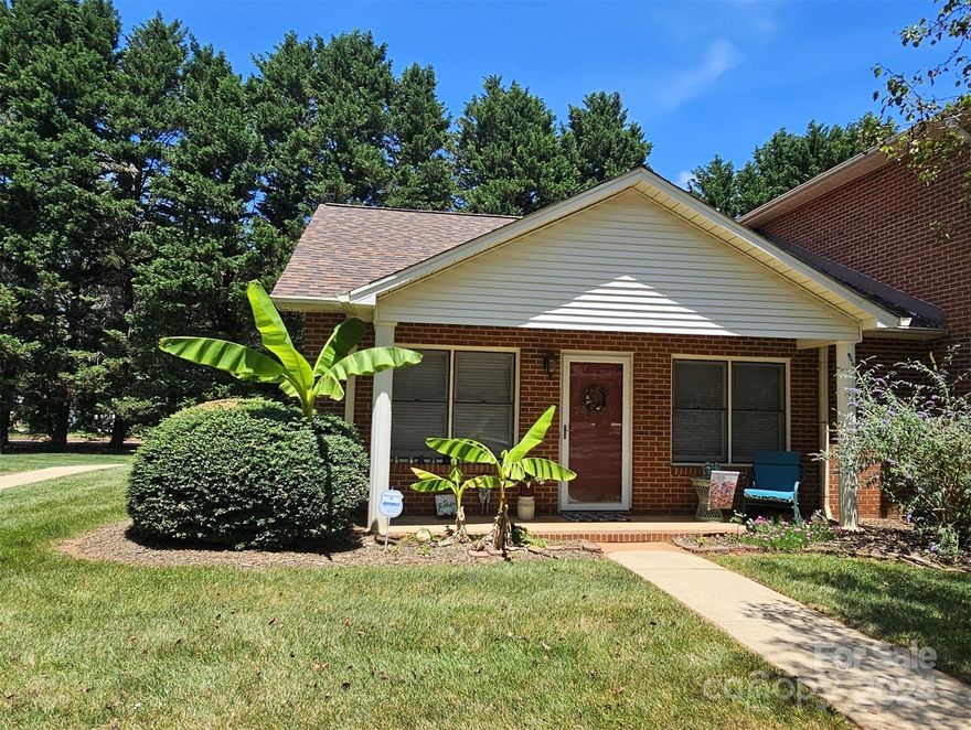 Front Porch sittin' comin at ya for $175K...and $150 HOA's with a pool? YEP! Popular Brandywine all brick END UNIT within walking distance to grocery, restaurants, -workout facilities, Vet, carwash, Walmart. This unit has a lot of privacy, rocking chair front porch, back patio overlooking mature tree line. 2 parking spaces. Kitchen has a bar/window through to dining/living room! Fridge, blinds, ceiling fans, laundry area, good size bedroom closets and front room can be used as front office/flex space! This unit is freshly painted & ready to go- Carpet only in bedrooms- ...this will not last long at this price!  Cute as a button and waiting for it's new owner! Roof included in HOA & has been recently replaced, HVAC/furnace is 7-8 yrs old, fridge, washer & dryer remain. Close by to the 16, 40 & 77 interchanges- this is such a great unit...where within an hour to Charlotte are you finding a deal like this? Snatch it up quick!