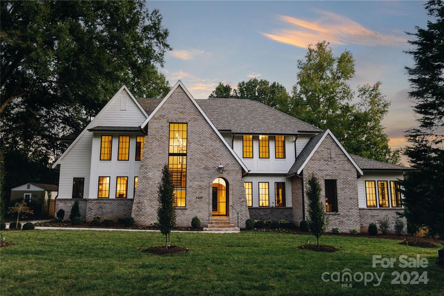 This one-of-a-kind custom-built home will blow you away. From the spectacular front elevation to the open large living area, featuring a fireplace, 11-foot ceilings & a 12-foot folding door wall out to the amazing covered porch & outdoor fireplace. The to-die-for chef's gourmet kitchen offers a large, user-friendly island w/seating for 5, a scullery & a pantry plus an ice maker. The primary suite has a gorgeous 2-sided, multi-head, walk-through shower, relaxing soaker tub, gigantic his & hers walk-in closets w/2 separate toilet rooms. 1st floor also has a laundry, a nearby back door drop zone area, a comfy sunroom & a front-facing office. The whole house has tons of top-of-the-line Pella windows that provide beautiful natural light throughout & real hardwood floors. The 2nd floor has 4 HUGE bedrooms, 3 full baths, one half bath, an upper den area, plus a bonus room. The 3rd floor features an enormous playroom & plenty of storage. The backyard features an in-ground pool & is fenced-in.