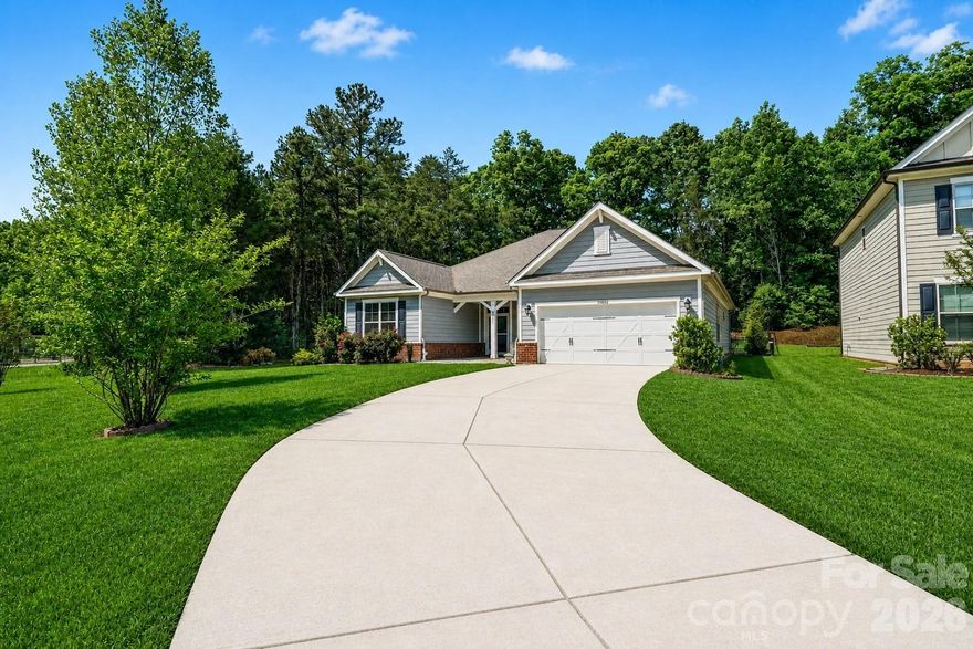 ***OWNER FINANCING AVAILABLE - INTEREST RATE AS LOW AS 5%****

Tucked quietly at the end of a cul-de-sac, where the noise fades and the trees take over, this impeccably maintained ranch invites you to slow down, breathe a little deeper, and truly feel at home.

From the moment you arrive, the setting tells the story! No neighbors across the street or to your left side, a generous cul de sac lot that lives larger than expected, and a charming covered front porch that feels like it was made for morning coffee and evening unwinding.

Step inside, and the openness immediately draws you in. Sunlight pours through the living space, highlighting soaring ceilings and a cozy fireplace that anchors the room perfect for gathering, relaxing, or simply enjoying a quiet night in. The layout flows effortlessly into a beautifully appointed kitchen designed with both function and connection in mind. With 42-inch cabinetry, granite countertops, stainless steel appliances, and a wide island that naturally becomes the heart of every conversation, this is where memories are made.

Just beyond, the screened in back porch offers a peaceful retreat! Your own private escape overlooking a fenced backyard that backs to woods offering views of deer and birds galore. Whether it's hosting friends, watching the seasons change, or enjoying the quiet privacy that’s hard to find, this space delivers.

The primary suite is a true sanctuary, featuring elegant tray ceilings, NO CARPET, a spacious walk-in closet, and a spa-like bath complete with a garden tub and separate shower, your personal reset at the end of each day. Two additional bedrooms and a versatile bonus/flex room provide the flexibility to fit your lifestyle, whether that’s a home office, playroom, or guest space.

Freshly painted and meticulously cleaned, this home is truly move in ready. And beyond your doorstep, the community offers amenities that elevate everyday living including an outdoor pool, playground, and serene pond while being just 10 minutes from I-485 for easy access to everything Charlotte has to offer.

All of this, zoned for the highly sought after Hickory Ridge Middle and High School, makes this home not just a place to live but a place to belong.