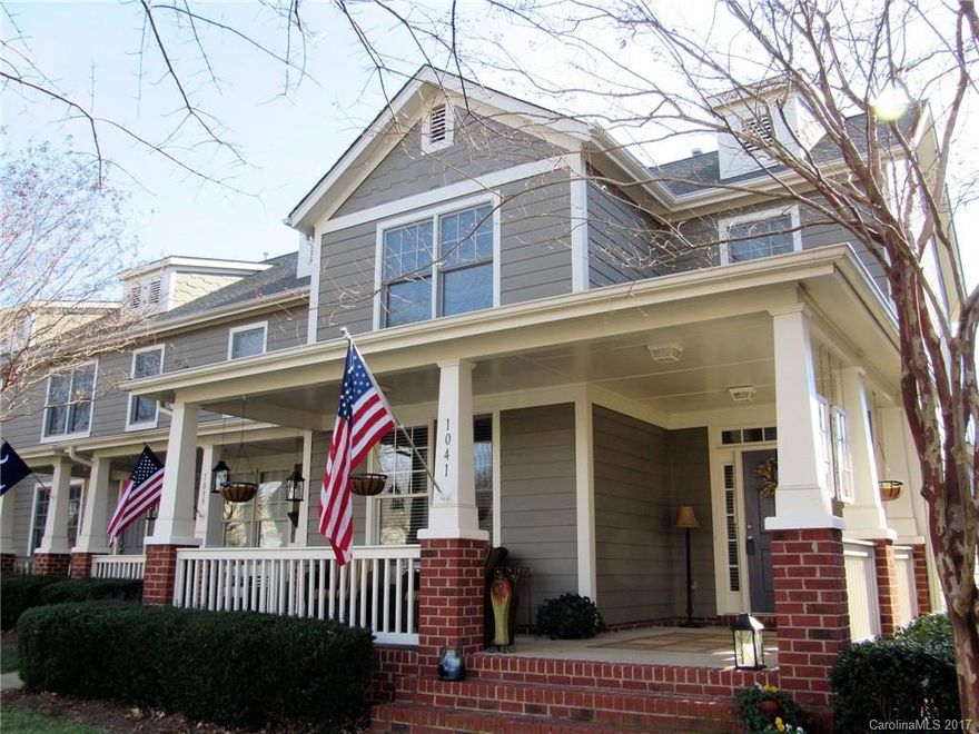 Beautiful upgraded 3 BR with full front porch, new interior paint, new carpet, new appliances and new Trane AC! Tile and HW flooring throughout most of main level, master suite down with spacious bath, large kitchen with plenty of cabinet and counter space, GR with vaulted ceiling, large dining room, 2 large BRs up plus sitting room/library and small office (also could be finished storage room), 2 car GA, prime location—walking distance to shops, etc.!