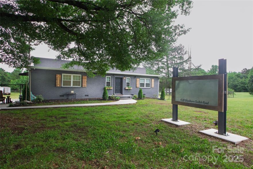 Versatile +/-3,800 sq ft shop space with +/-1.5 acres fenced.  

Key features include:  587 sq ft of finished office with a half bathroom.  There are two pull through bays with four 14' high doors / 12' wide.  One of the two garage bays is heated/cooled.  There is an additional office in the garage, a breakroom/storage area above, a dock, and a half bathroom.

This property is close to industry & a short drive from NC 74 (+/- 2 miles from NC 74).

This is a duplicate listing of MLS #4265577