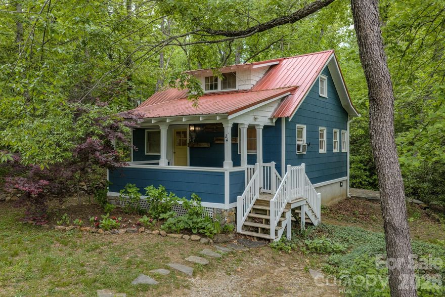 Charming 1916 bungalow in Ridgecrest, just minutes from Black Mountain and an easy drive to Asheville. Set on a .30-acre corner lot, this home offers mountain views, a peaceful creekside setting, and fresh interior and exterior paint—ready for its next chapter.

Enjoy morning coffee or evening sunsets from the large covered front porch with mountain views. A serene rock patio beside the creek creates a private outdoor retreat perfect for relaxing or entertaining.

Inside, the home features a 1 bedroom, 1 full bath layout on the main level, with an additional bedroom and bath upstairs, complete with a classic clawfoot tub. Original character and charm remain throughout, offering a great foundation for updates and customization.

With no storm damage and solid bones, this home presents a great opportunity for a primary residence, second home, or renovation project in one of Western North Carolina’s most sought-after areas.

Corner lot, mountain views, creekside setting, and classic bungalow charm—this is Black Mountain living with potential.