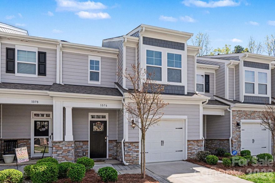 **Pest inspection and home inspection available upon request** Welcome to The Village at Ivy Ridge Townhomes, Clover, SC so close to great restaurants, entertaining, shopping, Lake Wylie, and the Queen City, Charlotte. This townhome sits in a great neighborhood featuring low monthly HOA dues, a community pool, fitness center, playground, picnic area, and excess parking at the cul-de-sac. Additionally, enjoy well-manicured and low maintenance yard, great curb appeal, an extended back patio, garden area, and wooded views. Inside, you will love this open floor plan. The kitchen, dining area, and living room are filled with tons of natural lighting, modern fixtures, and LVP flooring throughout. The kitchen features stainless steel appliances, a gas cooktop, granite countertops, a kitchen island with bar stool seating, and a pantry. Upstairs, you will find the primary bedroom, bathroom, and walk in closet along with very generous sized carpeted secondary bedrooms and walk in closets. The upstairs also includes the bedroom level laundry and a hall bathroom. This home is well maintained, move in ready, and priced to sell! Come take a tour today!