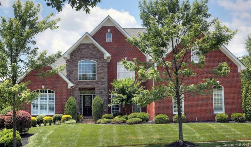 THIS IS ONE YOU WON'T WANT TO MISS!!! Beautiful home that is move in ready. Enjoy the huge back yard while overlooking the Tega Cay Golf Course. Located close to the cul-de-sac. Has beautiful landscape lighting. Spacious, open floor plan with the master bedroom on the main level, huge secondary bedrooms and closets. Plantation shutters throughout, granite, hardwoods, all brick and the list goes on and on!!! SCHEDULE A SHOWING TODAY!