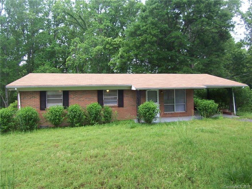 3 bedroom 1 bath home in Melrose subdivision. Freshly painted. Neutral colors. Hardwoods throughout. Covered front porch. Rear deck. Single carport with storage room. House sold AS IS.