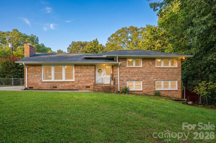 This home offers both the space you need and the modern updates you desire. This beautifully updated 5-bedroom home sits on a generous 0.7-acre corner lot, featuring a versatile layout with two spacious primary suites—one on the lower level and another on the upper level. The interior centers around a large living room with a wood-burning fireplace, perfect for cozy evenings, alongside a formal dining room for hosting friends and family. The kitchen is fully equipped with granite countertops, a tiled backsplash, and stainless steel appliances. Outside, the lifestyle truly shines with an expansive level fenced backyard. Whether you are hosting a summer barbecue on the massive 35x22 patio and deck, or relaxing by the firepit, there is plenty of room to roam. Recent updates, including a new roof (2021), new HVAC (2022), and new insulation (2024), provide long-term confidence, while the nearby park, nature trails, and library offer endless weekend activities right at your doorstep.