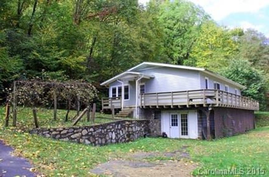 Here is that special Maggie Valley home you have been waiting for. 3 bedrooms, 1.5 bath, full unfinished basement, propane forced warm air with AC. Metal roof, wrap around decking, oak flooring, garden space and plenty of parking. Superb location with gorgeous mountain views close to everything in Maggie Valley & Waynesville.
