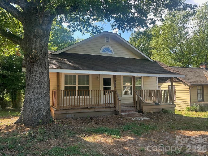 Charming vintage style home featuring 3 bedroom and 2 baths. Lovely covered front porch and large back yard. Primary with ensuite bath. Beautiful hardwood floors flow throughout the main living area. Dining room has built in china cabinet. Kitchen offers tile flooring, granite countertops and timeless appeal. Full of character and warmth, this home blends classic charm with everyday comfort. All on one level!!