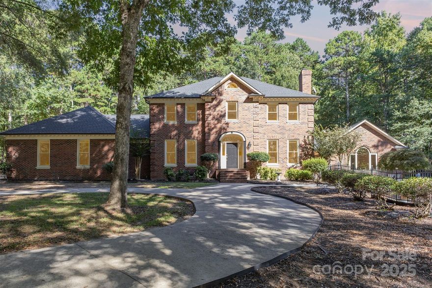 This beautiful all-brick home is a true retreat, nestled on 6 acres of a tranquil wooded estate.  Designed for a life of comfort and elegance, this home's interior is filled with abundant natural light. It offers expansive living spaces, a modern kitchen, and features stunning details like traditional hardwood floors and distinctive moldings. Upstairs, the private quarters include a grand primary suite, airy bedrooms, and a versatile flex space. Outside, your private oasis awaits with a beautiful gazebo perfect for relaxing and entertaining next to the sparkling in-ground pool, all surrounded by your own peaceful quiet estate.
With easy access to major highways, this home's location makes your daily commute and errands a breeze.