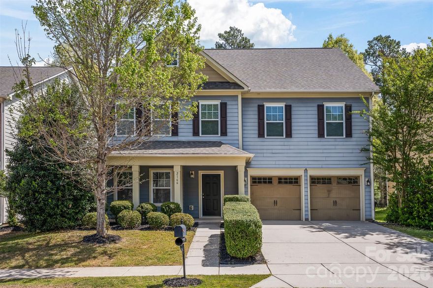 Beautifully maintained 5-bedroom, 3.5-bath home in the highly desirable Lake Ridge community of Tega Cay! This spacious three-story home features an open floor plan with a bright and inviting main living area, complete with a gas fireplace and seamless flow into the dining space and well-appointed kitchen with double ovens, gas cooktop, and breakfast bar—perfect for entertaining. Upstairs, the expansive primary suite offers a relaxing retreat with a garden tub, along with additional bedrooms and convenient upper-level laundry. The third floor provides a versatile bonus space with an additional bedroom and full bath—ideal for guests, a home office, or playroom. Enjoy outdoor living with a covered front porch, patio, and fenced backyard. Additional highlights include a 2-car garage and access to community amenities such as a pool, clubhouse, fitness center, playground, and tennis courts. Conveniently located near shopping, dining, and everyday conveniences! *Some images in this listing have been virtually staged.