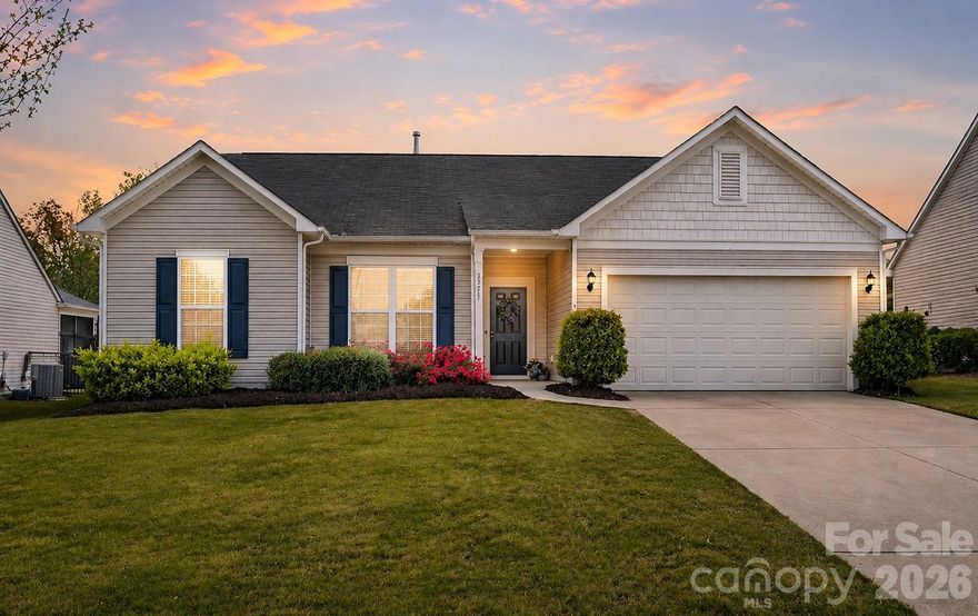 Skip the stairs without sacrificing space — this nearly 2,500 sq ft ranch in sought-after Audubon Lake delivers the layout, flexibility, and lifestyle today’s buyers are actually searching for.

Perfectly positioned on one of the community’s most desirable cul-de-sacs and directly across from the amenities, this single-owner home offers rare convenience just minutes from Ballantyne and the NC state line — paired with a private, wooded backdrop that’s increasingly hard to find.

Designed for the way you live, the open-concept floorplan blends everyday comfort with effortless entertaining. The great room is elevated by warm cedar wood beams that extend through the kitchen and dining areas, creating a cohesive, high-end feel rarely found at this price point.

The kitchen anchors the home with granite countertops, a farmhouse sink, stainless steel appliances, and a dedicated coffee bar — all seamlessly connected to the main living space. Natural grain LVP flooring, recessed lighting, and 9-foot ceilings enhance the bright, airy flow throughout.

A dedicated pocket office offers the flexibility today’s buyers demand — ideal for working from home, managing daily life, or easily converted into a scullery or prep space for those who love to entertain.

The formal dining room is currently styled as a flex space, giving you options for a second living area, playroom, or media room — functionality that rivals many larger homes.

A split-bedroom floorplan adds privacy, while the drop zone keeps everyday living organized.

The spacious primary suite delivers a true retreat with a spa-like bath featuring a large walk-in shower with both rain and wall shower heads, plus an exceptional walk-in closet.

The 3-car tandem garage offers rare flexibility — perfect for a golf cart, hobby space, or that “fun” weekend vehicle.

Enjoy a fully fenced rear yard with a private wooded view — no rear neighbors — plus a gas line ready for grilling or a future fire feature, making outdoor living just as inviting as the interior.

And just steps away, Audubon Lake’s updated amenities deliver — featuring a renovated playground, green space, pavilion, and resort-style pool with waterslides.

Homes with this combination of layout, privacy, and proximity rarely come available — especially in this price point.

***some photos have had virtual additions or alterations-the rear patio photo has been virtually mocked up for idea creation, additional patio, fire pit, gazebo and lights are not currently in place and not included