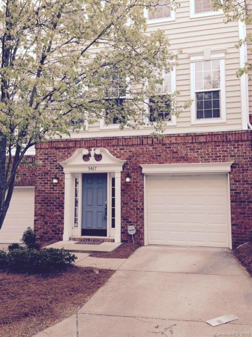 3 level townhome.  First floor has foyer with study, laundry and half bath.  Level two has wood floors in kitchen and living room.   Kitchen has solid surface counters with farm sink and white cabinets.  Level three has two bedrooms with two full baths.