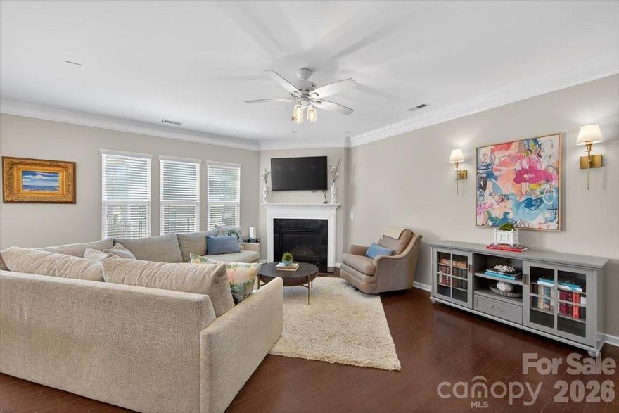 Welcome to this beautiful 3-bedroom, 2.5-bath townhome in the Park South Station community. There is an abundance of natural light complimented by the tall ceilings. The cozy living area with a fireplace offers the perfect space to unwind. The spacious primary suite features generous storage and a large walk-in closet, providing both comfort and functionality. Enjoy outdoor living in the fenced-in backyard with a private patio—ideal for relaxing or entertaining. Complete with a 2-car garage, this home blends convenience and style. Residents of Park South Station enjoy exceptional amenities including a pool, clubhouse with fitness center, dog park, and playground, all just minutes from SouthPark and with easy access to the Sugar Creek Greenway.