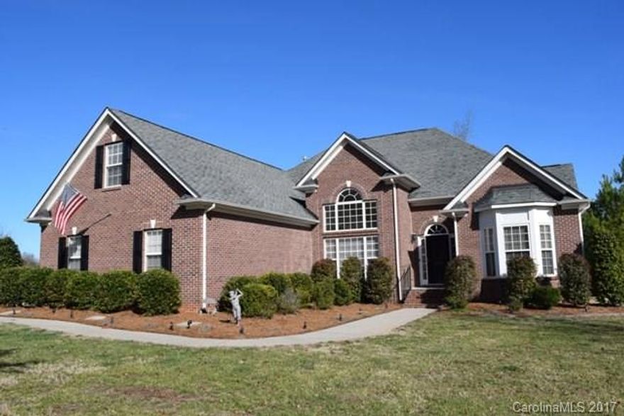 Beautiful home situated on 1.5 acres in a great neighborhood.  All living on the main level with the exception of huge bonus room or 4th bedroom and full bath upstairs.  Split bedroom plan, hardwood and tile flooring throughout!  Master bedroom has two walk-in closets and vaulted ceiling.  Spacious great room with fireplace/gas logs, formal dining room and living room/office.  Kitchen has stainless appliances and breakfast area.  Oversized triple garage and large deck.