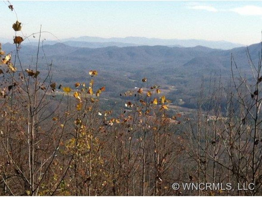 Located about 6 minutes south of I-40 at Old Fort  and 30 minutes from Asheville. Beautiful land with about 4 acres of cleared fields and the potential for another 50 acres of rolling land perfect for horses or other livestock. Incredible long-range views on top of ridge which includes both sides for stellar 360 degree VIEWS. Several small creeks on property. Level 25 ft deeded R/W from paved road to subject property. End of road privacy.