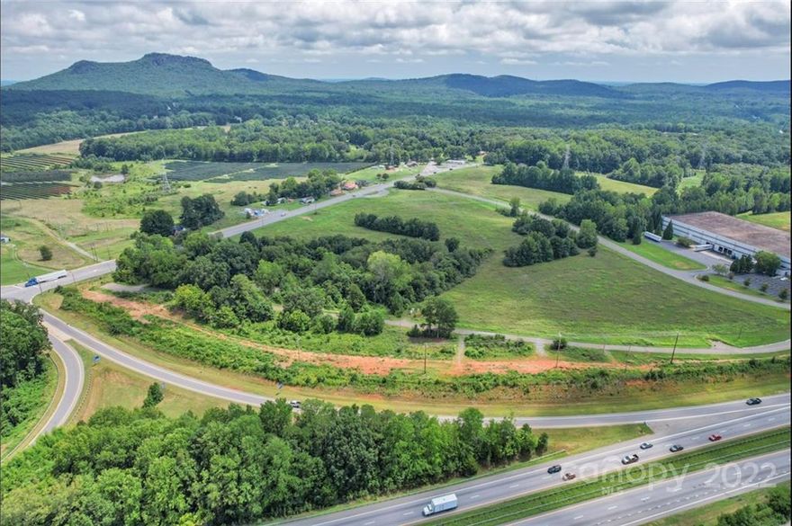 Commercial land for sale with high visibility from I-85 and Hwy 161. Easy access to I-85 at exit 8. Approximately 8.13 acres. May be great for fast retail service. Zoned GB
This highly visible 8.13-acre site is located right at Exit 8 off of I-85 in Kings Mountain. There is easy access with Charlotte just a short 20 minute drive and Spartanburg, SC less than an hour away. The Catawba Two Kings Casino is the very next exit and just a few minutes drive.
Convenient access to Charlotte DouglasInternational Airport makes Kings Mountain a very desirable place to live and fantastic place to open new business ventures.
Buyer Agents welcome!