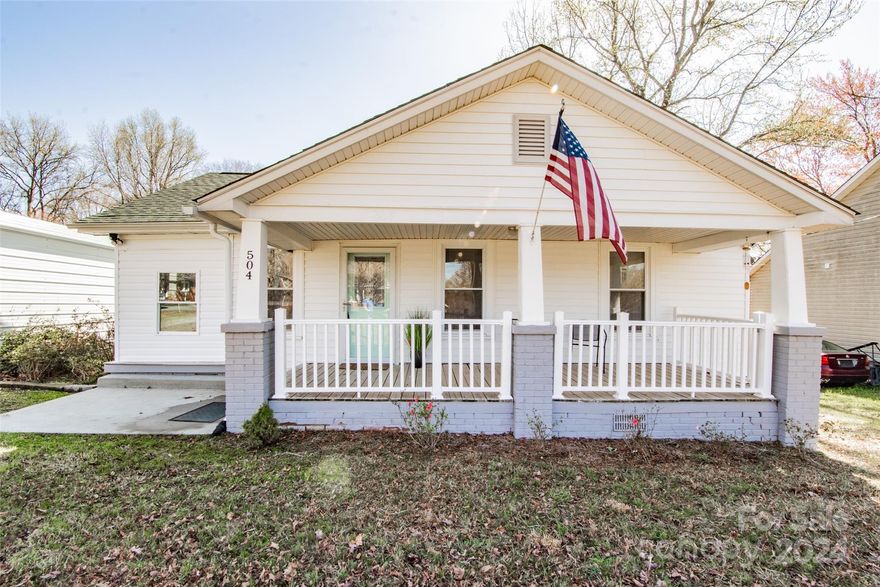 Charming 1930's bungalow with a welcoming covered front porch, detached garage space for three cars and a completely fenced-in backyard. Step into a cozy living space with added square footage to be used a sunroom, office, playroom, or however you see fit. Dining space opens up to a good size kitchen with separate laundry room and views of the wide backyard. Bedrooms are conveniently positioned on one side of the house with full bathroom in between. Easy access to I-85 and 5-10 minutes from downtown Kannapolis.