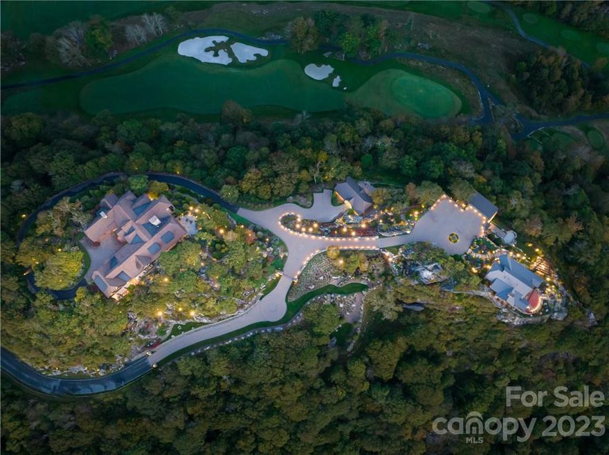 High in the Blue Ridge mountains, with rocky outcroppings and extensive surrounding peak views, the Lazy Bear Lodge sits on 5.86 acres of ridgetop.A total of four lots create this gated compound with views that are seldom found.This Lodge blends Western art, mountain architecture, European and Adirondack influences to perfection.Elegance guided by views of Grandfather Mountain and surrounding peaks, Cypress post and paneling, golden birch, poplar and cherry barks, soften the locally sourced stone and timber design. The Greatroom is a 25 ft Timber framed structure with custom lighting. The phenomenal custom kitchen showcases custom alder cabinets, a tri-section refrigerator with custom carving and Elk antler pullsThe Folly house is a spectacular setting offering a entertaining space with a full kitchen,dining, and sitting area.The Hobbit house for exercising and a golf simulator, wet bar, sauna and ½ bath. Golf cart building could be additional guest house
TAXIDEREMY has been removed