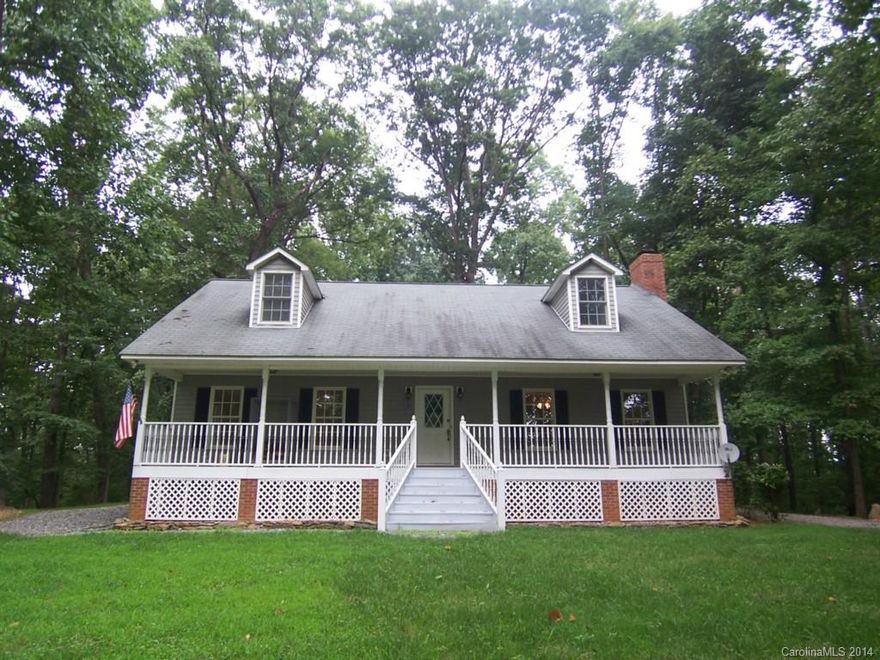 Cape Cod on 3 acres adjoining a 50 acre horse farm, large rooms, bonus, double garage, gated entrance, all appliances remain, gorgeous setting, 45 mins from Charlotte, new paint and flooring.