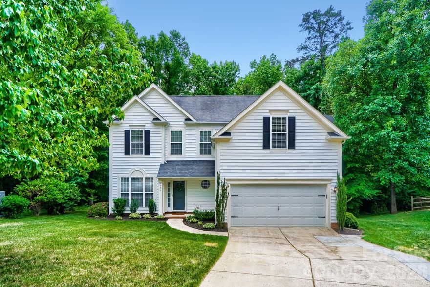 Welcome to this lovely cul-de-sac home in the highly sought after Highland Creek! Inside you'll find a sunny two-story foyer open to a spacious dining room. A large living room with cozy fireplace connects with the eat-in breakfast area. Step right into the bright kitchen with white cabinets, granite counters, and stainless appliances... Refrigerator Included! There is even a built-in desk area - the perfect place to sort mail or create a coffee bar. The open floor plan is perfect for entertaining!!!! Upstairs you'll find a spacious primary suite, dual vanities, large garden tub, standing shower, and a large walk-in closet with a window. There are generous secondary bedrooms, and the 4th bedroom could serve as a sizable bonus room with a storage closet. Step outside and be transported to your own private oasis: large concrete patio, mature trees, and NO backyard neighbors! If that's not enough, you can enjoy the neighborhood's many amenities: in-ground pools, clubhouses for rent, tennis and pickle ball courts, walking trails, and golf club. Come see what makes Highland Creek such a special place to live.
