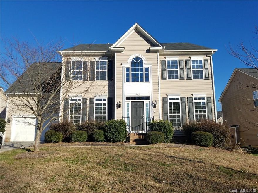 Gorgeous home with 3000 s.f., 4 BR, 2.5 baths. Main level boasts gorgeous dark walnut hardwood flooring in the office with french doors, large dining room, sitting room, great room, kitchen and breakfast room! Upgraded kitchen has lots of cabinets, granite counter tops, designer tile backsplash, center island, breakfast bar and stainless steel appliances including refrigerator. Upstairs are 4 BRs. Elegant master suite with dual sinks, separate shower and garden tub. Lots of closets. Fenced yard! Desirable Fair Oaks subdivision in Fort Mill offers a community pool and walking trails and is only minutes to Charlotte, I-77 & I-485.