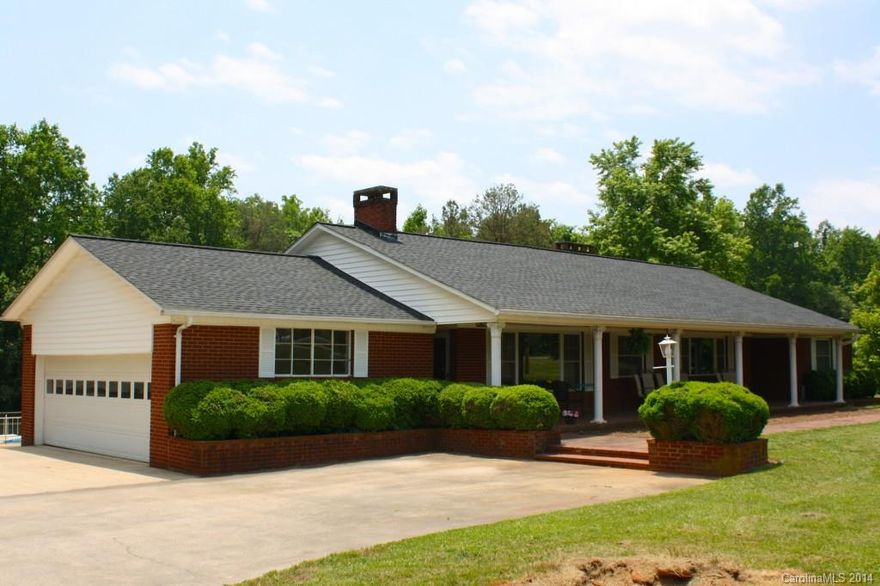 PRICED BELOW APPRAISED VALUE! As of 10/9/14 NEW CARPET, NEW Stainless Steal DISHWASHER and MICROWAVE! NEW beautiful FLOORING!! This home has everything! Pool with diving board, 2 car garage, additional detached garage that has been insulated. Storage is abundant at this home! Inside includes 3 fireplaces, huge dining room, large office and sunroom. Downstairs is second living quarters with a kitchen. NEW ROOF installed 2012 by Home Depot with lifetime warranty, HVAC & pool sand filter 2014.