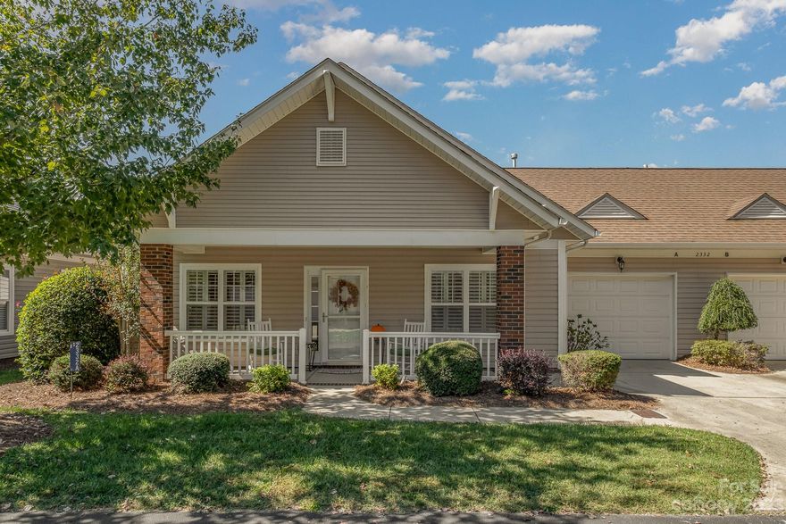 Be a part of The Village of Woodridge, a 55+ independent living community. Seller pre-paying HOA fees for a year due to changes in HOA. Enjoy sitting & relaxing on your rocking chair front porch (2 chairs included) or your private backyard patio. Upon entering you will be greeted with the living room, two bedrooms & two full baths before entering into the kitchen. The kitchen has plenty of cabinet & counter space, an eat in kitchen area including a breakfast bar & 2nd living room/den. Plantation shutters throughout the home, hardwood floors for easy cleaning & mobility, handicap features installed throughout the home for added safety & has a Knox box on front door for emergency 911 use. The HOA fees covers exterior maintenance & insurance, pest & landscaping, weekly/monthly activities such as (but can change) exercise classes, card & bingo games, wine tasting & holiday parties. Private mail boxes inside the Village Center. Oversized 1 car garage for extra storage. Original Owner
