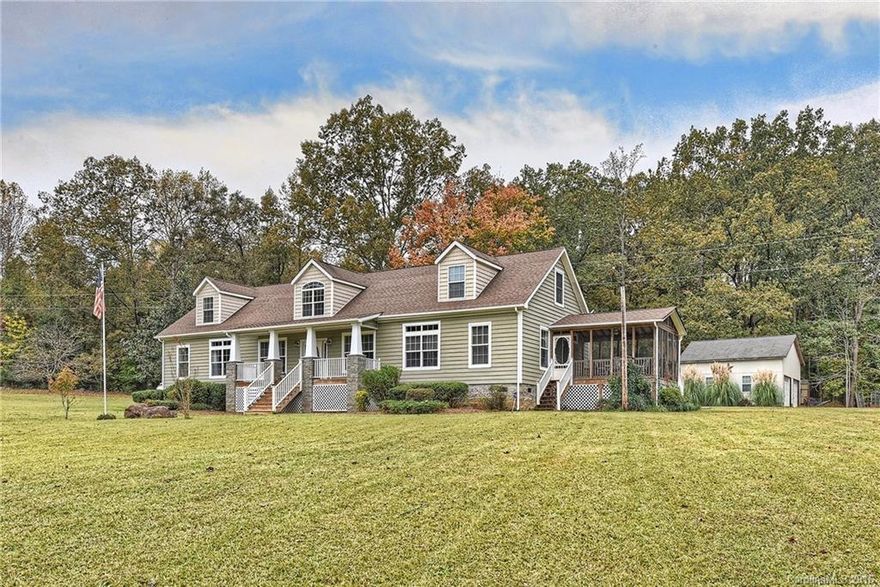 Amazing Cape Cod located on 5.74 acre wooded lot featuring walnut, oak, dogwood and poplar trees. Master on main, total of 4 bedrooms and 4.5 baths, loft, office, laminate floors throughout main living areas, kitchen offers slate floors, raised panel cabinetry, under cabinet lighting and huge island with area for bar stools, formal dining room, screened porch, large deck, oversized 2-car detached garage, 2 storage buildings, play-set and playhouse.  Union County schools and taxes!