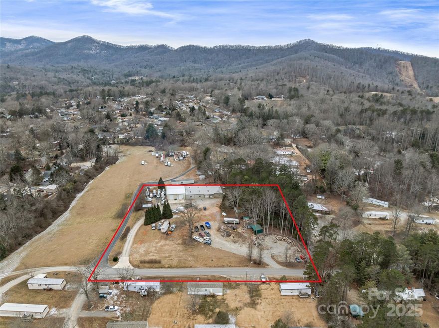 Clean, heated warehouse in great condition with plenty of space for laydown yard and fully conditioned offices.   Located just off Brevard Rd minutes to I-26 (exit 33), and only 15 minutes from the Asheville Regional Airport and WNC AG Center. 6,000 SF built in 2003, 3,000 SF added in 2023.  Highlights include one 10'x10' and two 12'x12' drive-in doors, a new HVAC system (2022), LED lighting, 3 private offices, 2 bathrooms, and a break room. City water and septic installed.