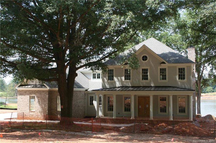 Custom built and modified "Rachel" plan being built by Nest Homes of Mooresville. Open floor plan with 2nd prep Kitchen, office and study spaces and generous sized bedrooms. Patio leading to custom in-ground pool. Beautiful flat waterfront home site.
