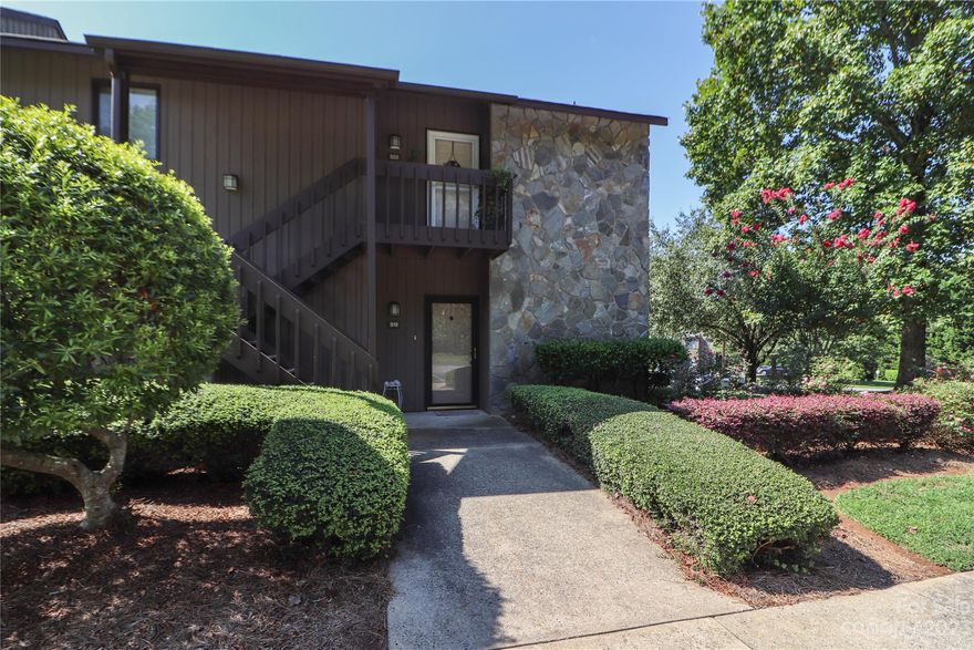 Main level condo featuring 2 bedrooms, two full baths. Open living area with stone accent fireplace, kitchen features lots of counterspace. Back and side porches allow lots of natural sunlight and views of the community pool.  Minutes from shopping, restaurants, schools, grocery, boat launch! Two utility spaces allow easy access storage. All on ground level.