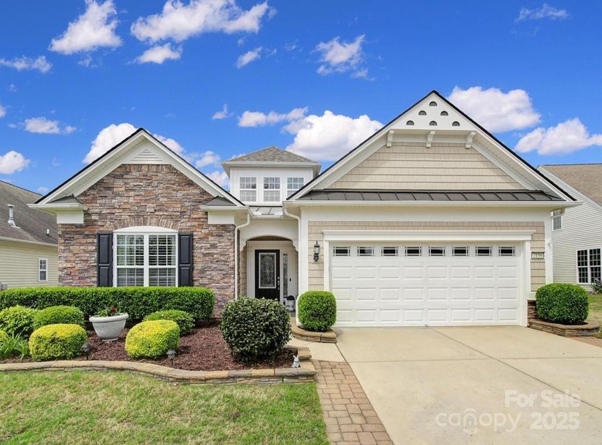 Stunning home in 55+ Sun City Carolina Lakes. This immaculate Vernon Hill home offers a sunroom & 3-season room overlooking AMAZING View of water & trees. Relax on your paver patio w/motorized awning for shade & enjoy all that nature has to offer.  This open concept home features 3 bedrooms + office. Gourmet kitchen w/eat-in area, breakfast bar, granite countertops, tile backsplash & various rollout cabinet. Laundry room w/folding table & built-in cabinets. The primary suite sits at the back of home w/views & offers an ensuite bathroom w/walk-in shower, garden tub, dual sink vanity & walk-in closet. Two add'l bedrooms w/full hall bath access are in the front of home w/french door separating the area for guest privacy. Extended driveway, attic fan & storage, solar tubes for additional natural home lighting & extensive crown molding throughout the home. Make sure to check out the golf course/club & resort-style amenities. Conveniently located to shopping, restaurants & medical.