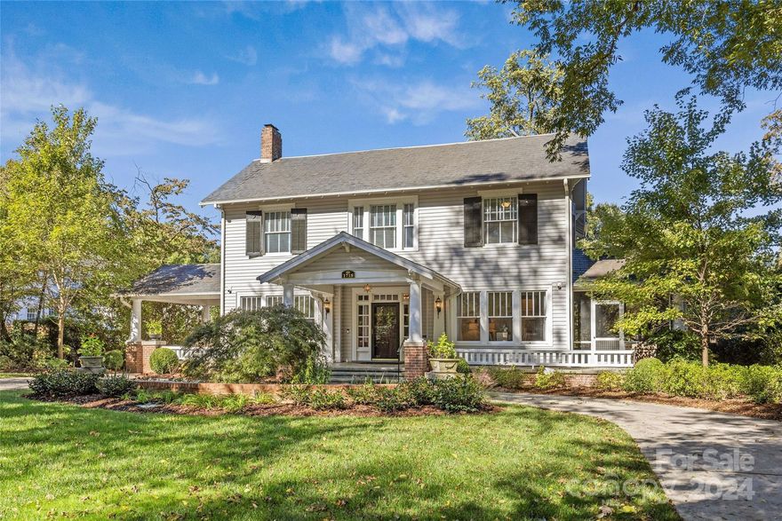 Stunning 1920s residence has been meticulously renovated while preserving its original charm! Situated on a sprawling half-acre lot along iconic Queens Road, this home is sure to impress. Masterful 2018 renovation by Andrew Roby showcases the historic elements incl. beautiful hardwoods and heavy moldings/original millwork blended with modern amenities. Main level boasts an elegant foyer, formal living & dining rooms w/ 10' ceilings and pocket doors, and spacious family room. The gourmet kitchen features custom cabinetry, stainless appliances, center island, and stone countertops PLUS butler’s pantry! Primary suite with en-suite bath and spacious walk-in closet. Exceptional outdoor living on the rocking-chair front porch, side screened porch or in the landscaped backyard complete with private perolga w/ firepit. Circular drive and porte-cochère provide easy accessible parking! Many nearby local shops, parks, and entertainment- don’t miss this rare opportunity to own a piece of history!