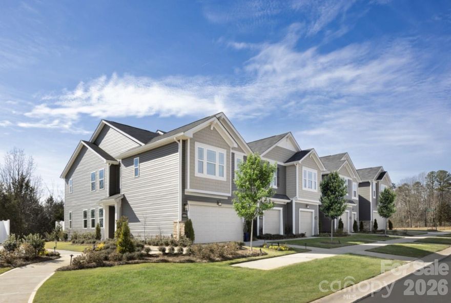 Ideally located just minutes from Uptown Charlotte, Charlotte Douglas International Airport, premier shopping, and dining, this elegant townhome offers refined living with everyday convenience. The Amira floor plan showcases 3 bedrooms, 2.5 baths, and 1,769 square feet of thoughtfully curated space designed for both style and comfort. A welcoming entryway sets the tone with a graceful wraparound staircase, ample pantry storage, and an expansive main living area that flows beautifully—perfect for hosting or unwinding in a sophisticated setting. Upstairs, the private bedroom suites provide a serene retreat, offering comfort, functionality, and privacy. Nestled within The Townes at Cheyney, residents enjoy low-maintenance living, planned amenities, and seamless access to I-485, I-77, and I-85, placing the best of Charlotte just moments away.