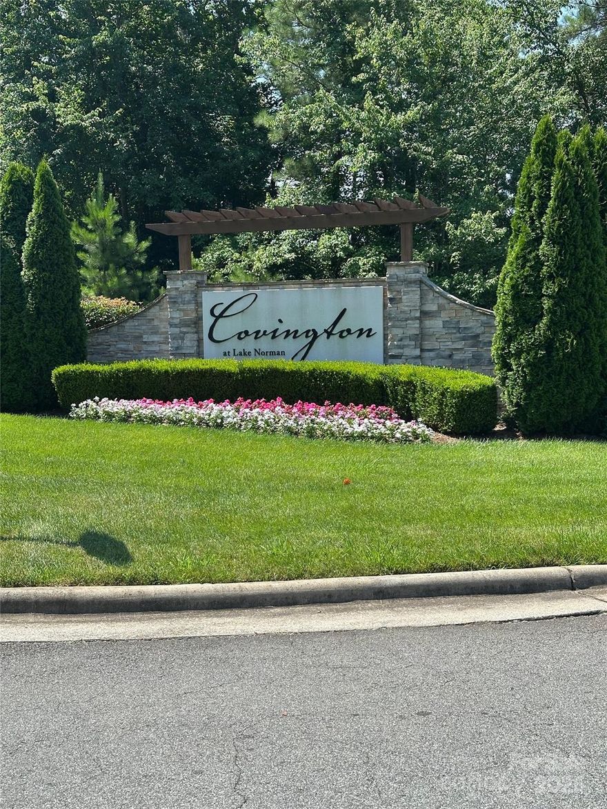 igious Covington Estates at Lake Norman community. Step onto the covered front porch & enter the bright & airy 2-
story foyer. Beautiful engineered wood floors on the main level along w/formal dining & separate living area /
flex/office. Guest bedroom on main w/large closet & bathroom w/granite top & tile floor. Open floor plan features
spacious living room w/gas log fireplace & kitchen includes breakfast area, large granite top island, gas stove,
stainless hood, wall mounted double oven, stainless Frigidaire refrigerator, subway tile backsplash & big pantry. Large loft/bonus area on 2nd level leads to Massive Master suite w / tray ceiling, 15' x 11' sitting area & 3 large closets. Gigantic Master Bath w / separate granite top vanities, tiled shower, garden tub & separate water closet. Public boat ramp is just .07 mile straight down the road and the neighborhood offers secured boat storage for a fee. Enjoy Lake Life.