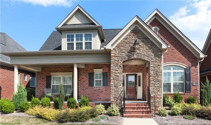 Are you ready for maintenance free living? Step out of your screened in porch and entertain on the dreamlike paver patio with an outdoor kitchen area. Open the plantation shutters and let the natural light flood the open floor plan. This home features the master suite on the main floor with two additional bedrooms. This home has almost every upgrade imaginable, and have to see it to believe it! Make this home yours and enjoy all the amenities of Laurel Creek without any of the yard work!
