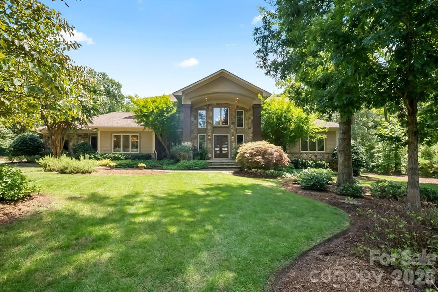 Luxury estate situated on 3 ACRES in prestigious gated community of Woodhall. High end custom kitchen, backyard oasis, furnished pool house, this home has it all. Mature trees on a private cul-de-sac lot located across the street from highly desirable Marvin Ridge Schools. Welcome into the home by a stunning two-story grand foyer with double staircase. The chef’s kitchen features top-of-the-line appliances, quartz countertops, and rich custom cabinetry. The main floor has a dedicated theatre room, recreation room with full wet bar, and a spacious primary suite complete with large walk-in closet. Entertainment inside and out with newly updated saltwater pool, outdoor grill area, 996-square-foot covered and screened lounge area with fireplace. Don't forget the outdoor batting cage with lights. Furnished pool house offers a full kitchen, living area, large bedroom, and two full bathrooms—ideal for guests or in-law suite. Meticulously landscaped grounds and maintained home.